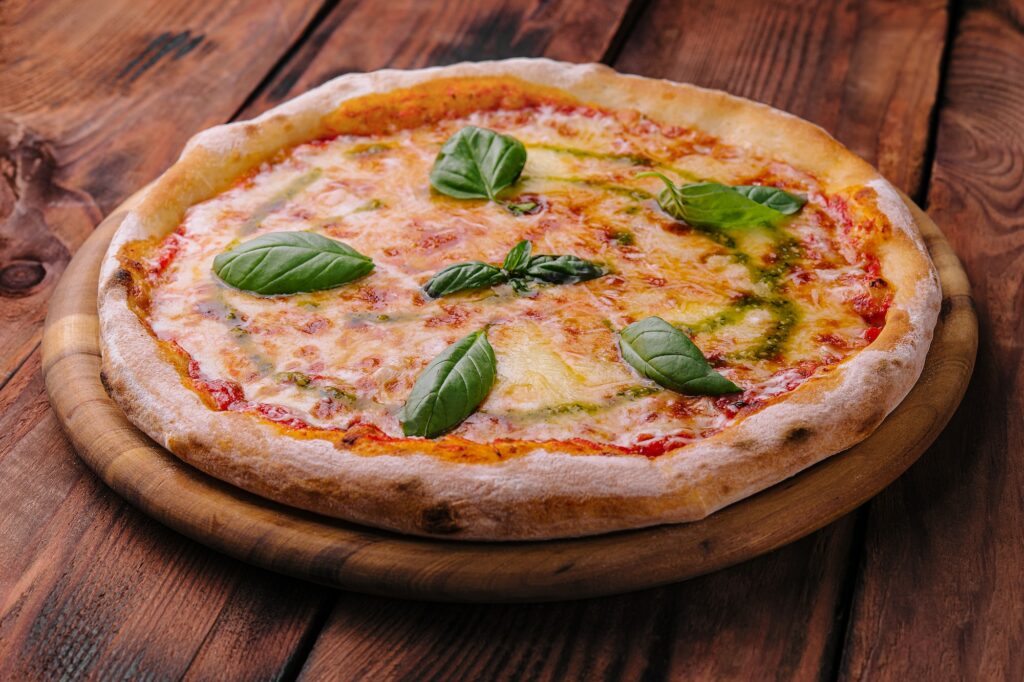 Homemade Pizza Italian margherita on wood